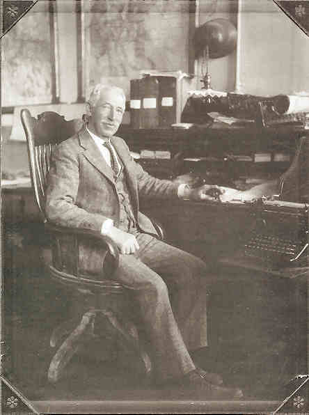 Gustav Becker at his desk in the store.